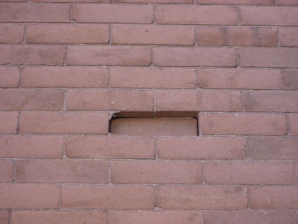 Damaged Brick on Wall